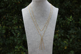 Verführerische, vergoldete Halskette mit Tassel-Detail - Der perfekte Schmuck, um Ihre Eleganz zu unterstreichen