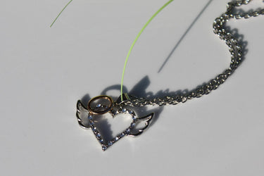 Einfacher Stil Herzform Flügel Metallkette Silber plattiert Damen Anhänger Halskette