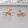 Rosa Damenschmuck: funkelnde Ohrringe mit pinken Rosen und Edelsteinen