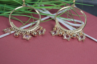 Große Kreis-Damenohrringe mit Sternen und Kugeln - Schmuck mit Charme